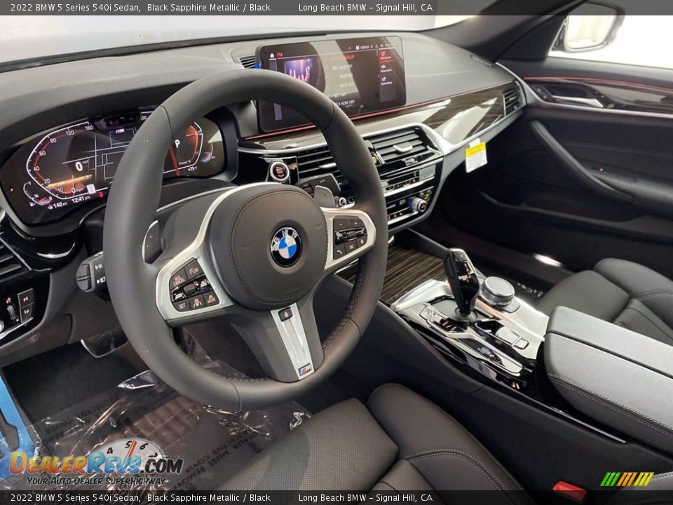 Dashboard of 2022 BMW 5 Series 540i Sedan Photo #12