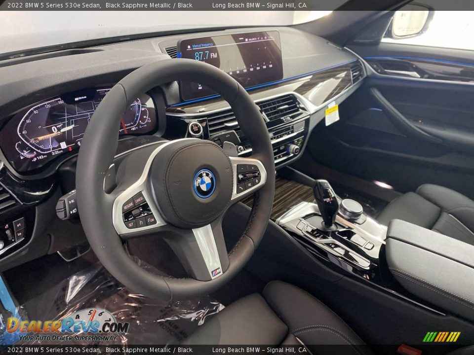 Dashboard of 2022 BMW 5 Series 530e Sedan Photo #12