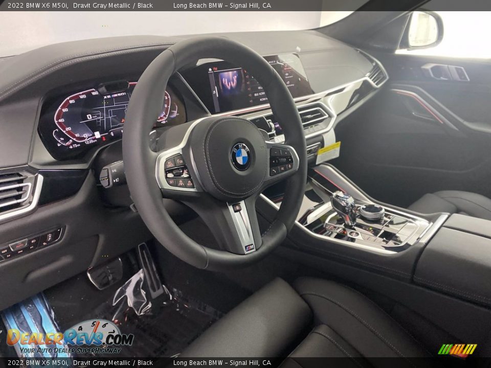 Dashboard of 2022 BMW X6 M50i Photo #13