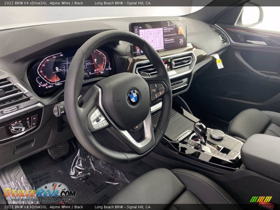 Dashboard of 2022 BMW X4 xDrive30i Photo #12