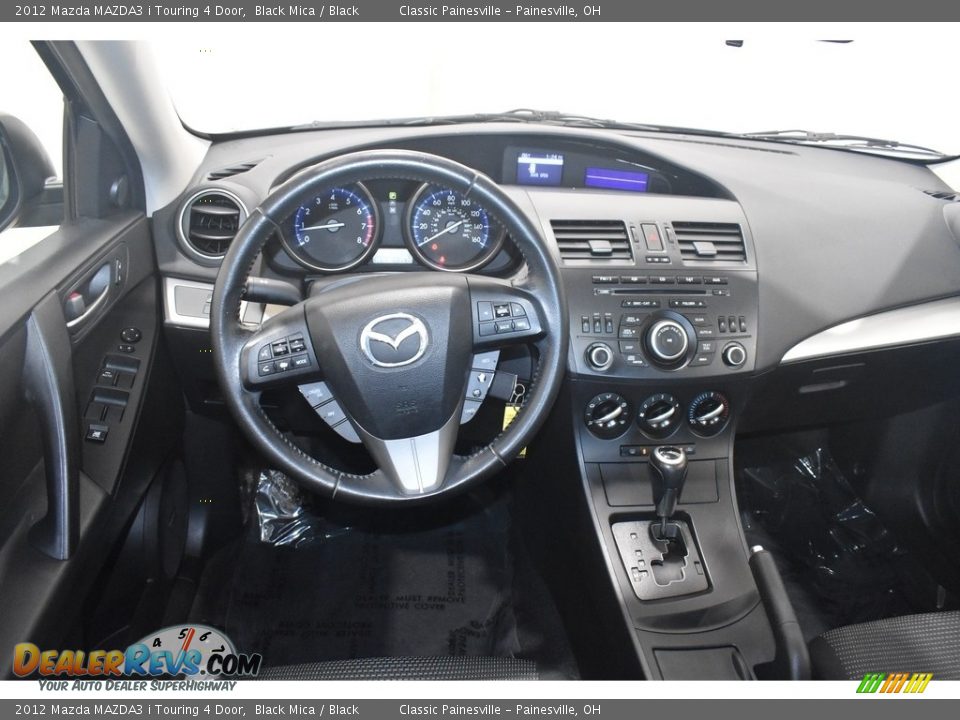 2012 Mazda MAZDA3 i Touring 4 Door Black Mica / Black Photo #13