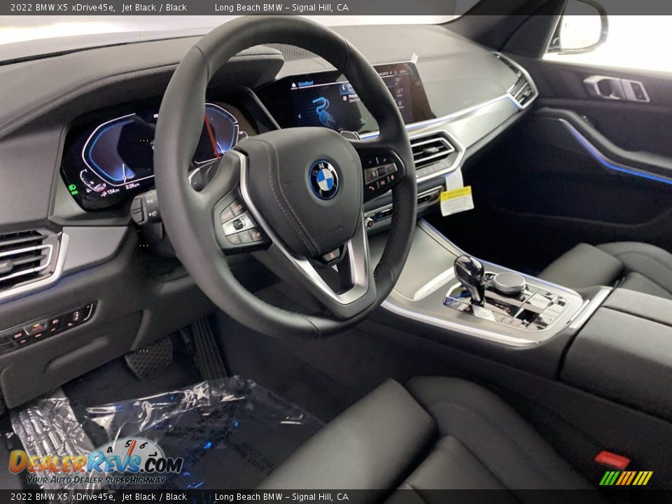 Dashboard of 2022 BMW X5 xDrive45e Photo #12