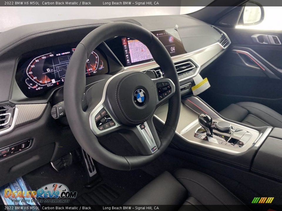 Dashboard of 2022 BMW X6 M50i Photo #13