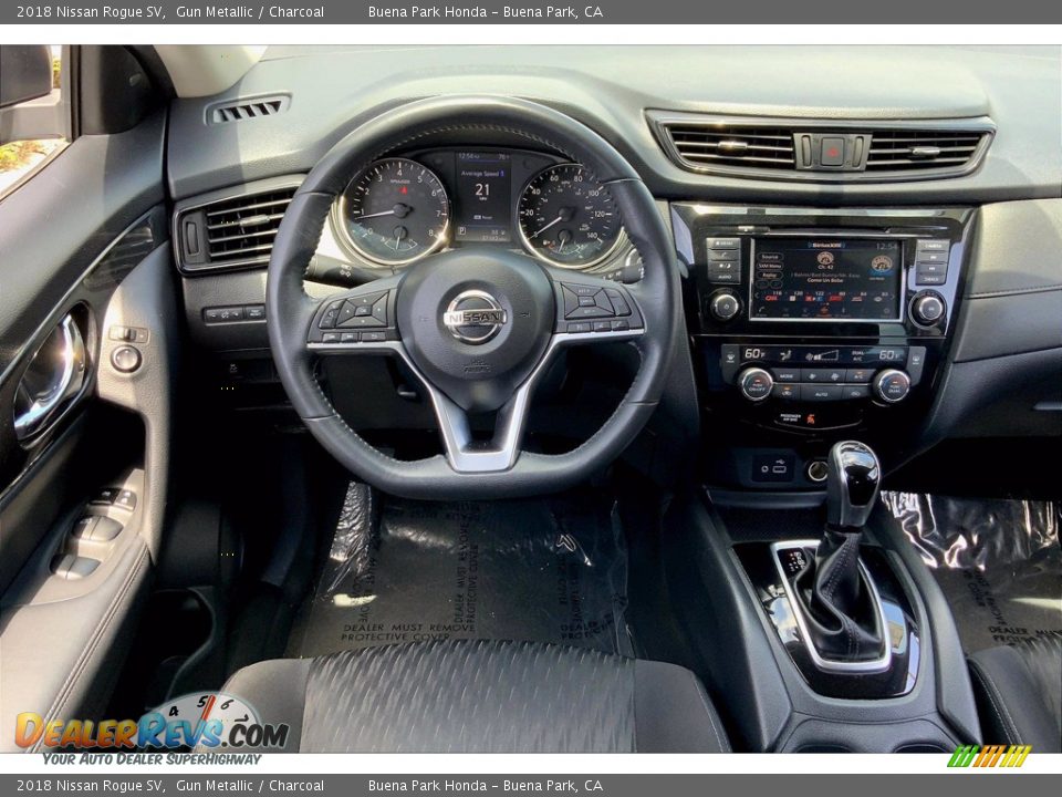 Dashboard of 2018 Nissan Rogue SV Photo #6