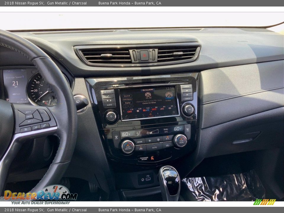 Dashboard of 2018 Nissan Rogue SV Photo #7