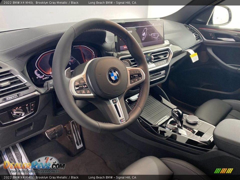 Dashboard of 2022 BMW X4 M40i Photo #13