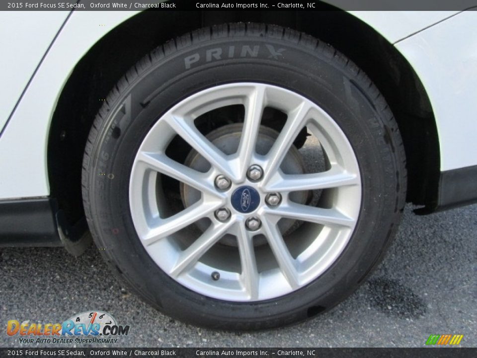 2015 Ford Focus SE Sedan Oxford White / Charcoal Black Photo #26