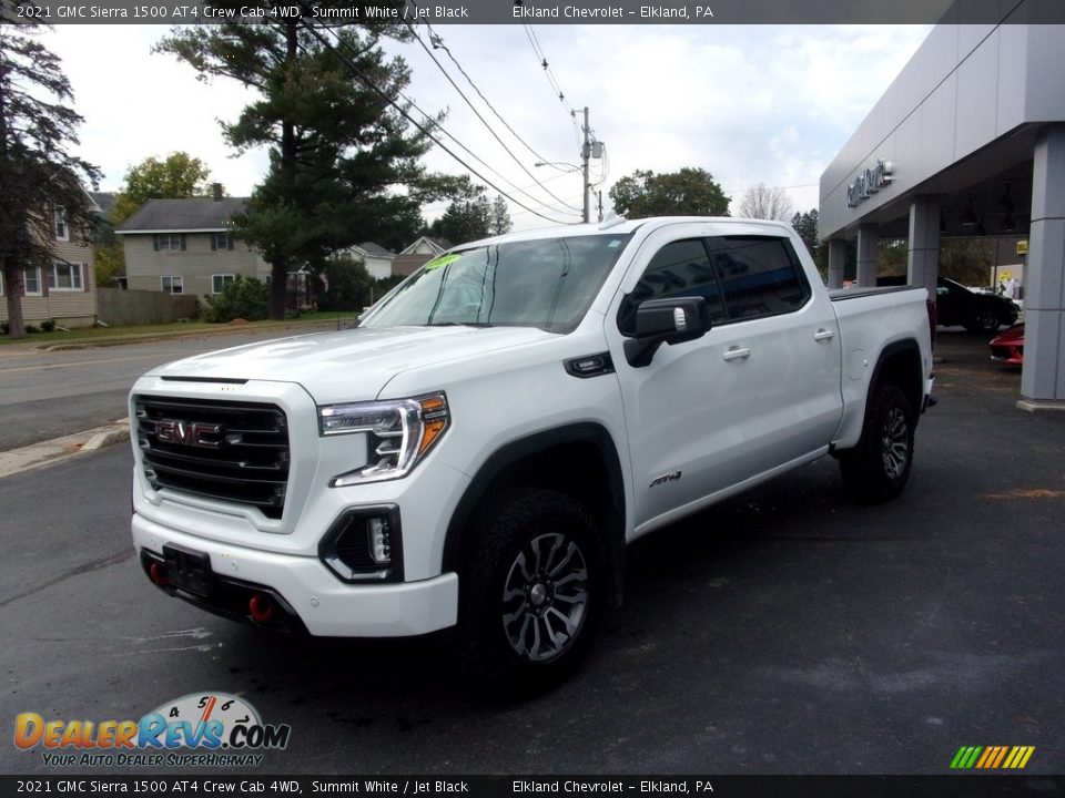 Front 3/4 View of 2021 GMC Sierra 1500 AT4 Crew Cab 4WD Photo #7