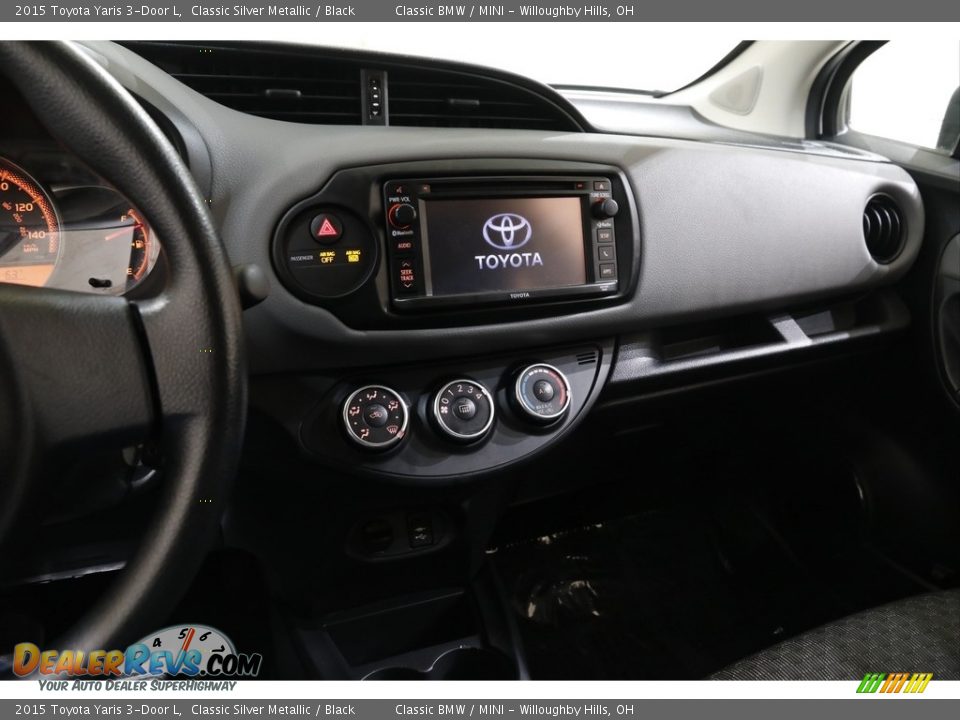 Dashboard of 2015 Toyota Yaris 3-Door L Photo #9
