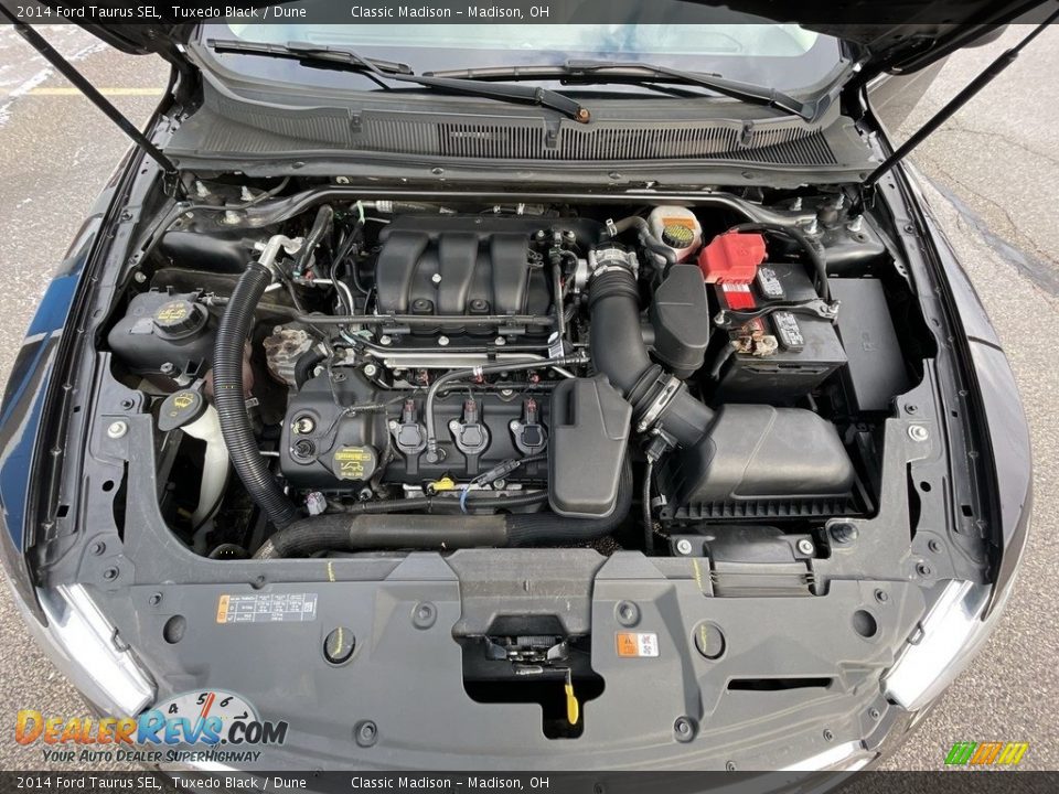 2014 Ford Taurus SEL Tuxedo Black / Dune Photo #19
