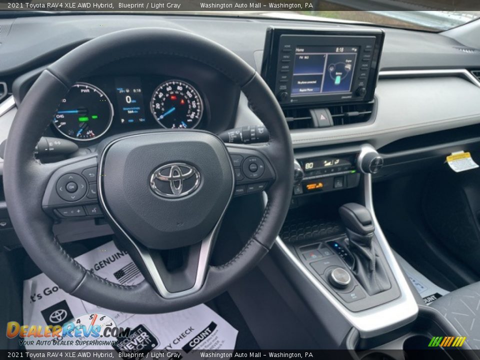 Dashboard of 2021 Toyota RAV4 XLE AWD Hybrid Photo #3