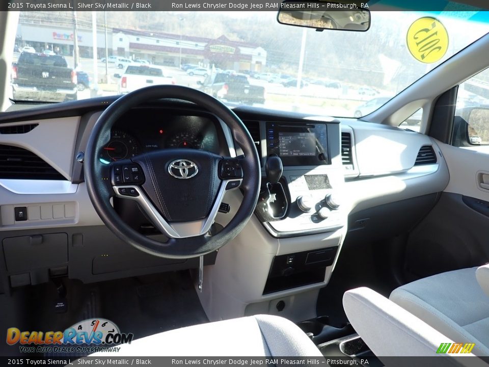 Front Seat of 2015 Toyota Sienna L Photo #13