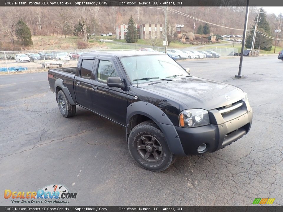 Front 3/4 View of 2002 Nissan Frontier XE Crew Cab 4x4 Photo #1