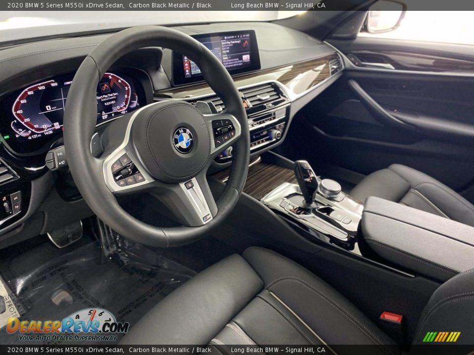 Dashboard of 2020 BMW 5 Series M550i xDrive Sedan Photo #15