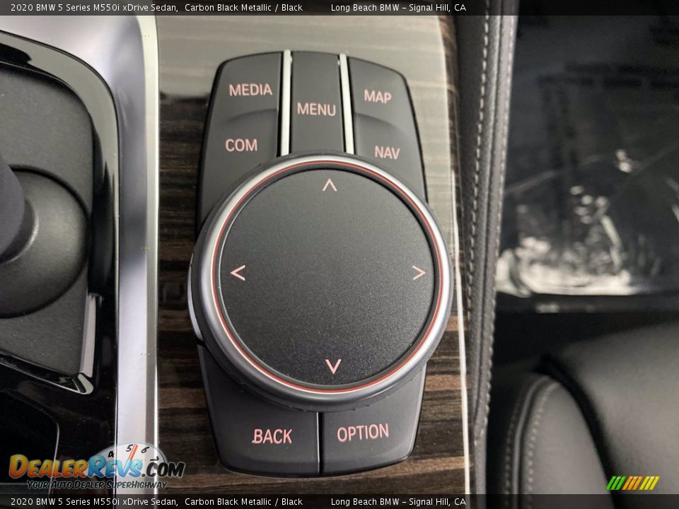 Controls of 2020 BMW 5 Series M550i xDrive Sedan Photo #25