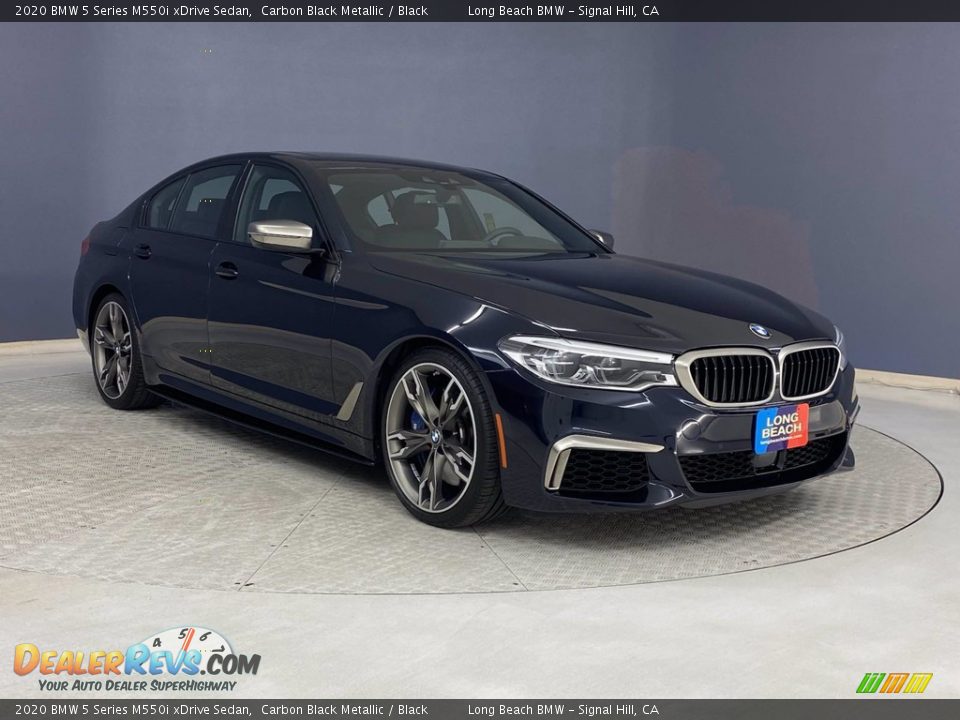 Front 3/4 View of 2020 BMW 5 Series M550i xDrive Sedan Photo #35