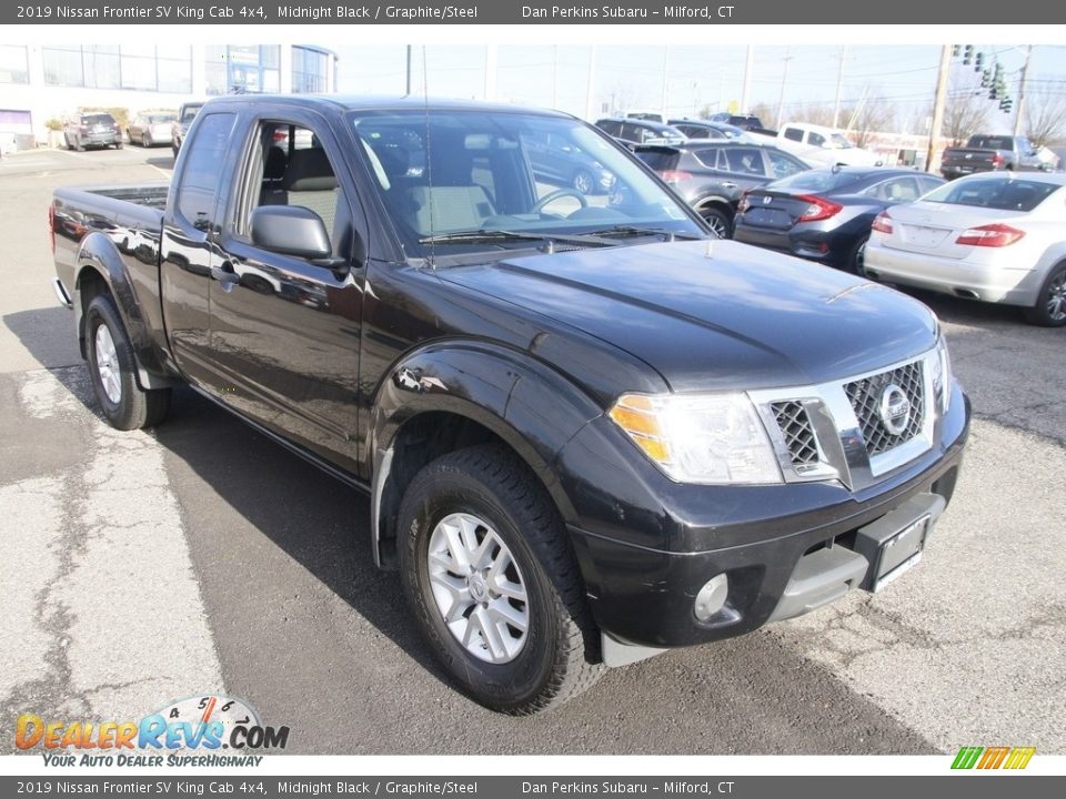 Front 3/4 View of 2019 Nissan Frontier SV King Cab 4x4 Photo #3