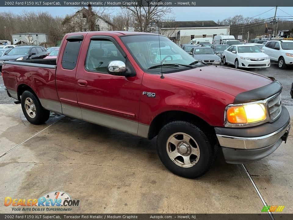 Front 3/4 View of 2002 Ford F150 XLT SuperCab Photo #2