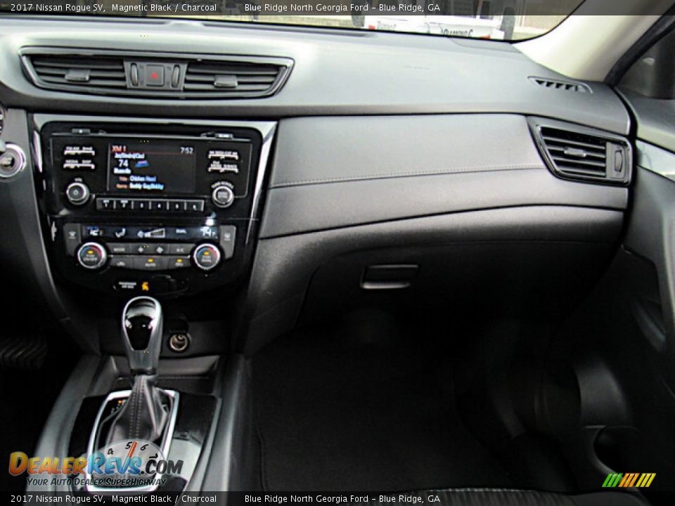 Dashboard of 2017 Nissan Rogue SV Photo #16