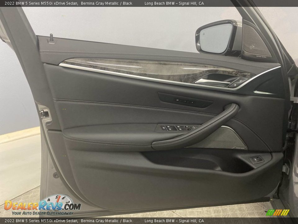 Door Panel of 2022 BMW 5 Series M550i xDrive Sedan Photo #10