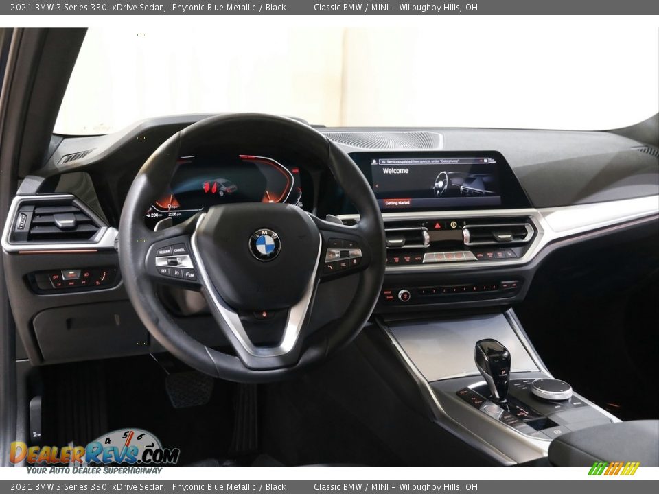 Dashboard of 2021 BMW 3 Series 330i xDrive Sedan Photo #6