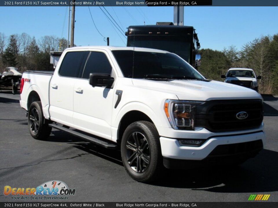 Front 3/4 View of 2021 Ford F150 XLT SuperCrew 4x4 Photo #7