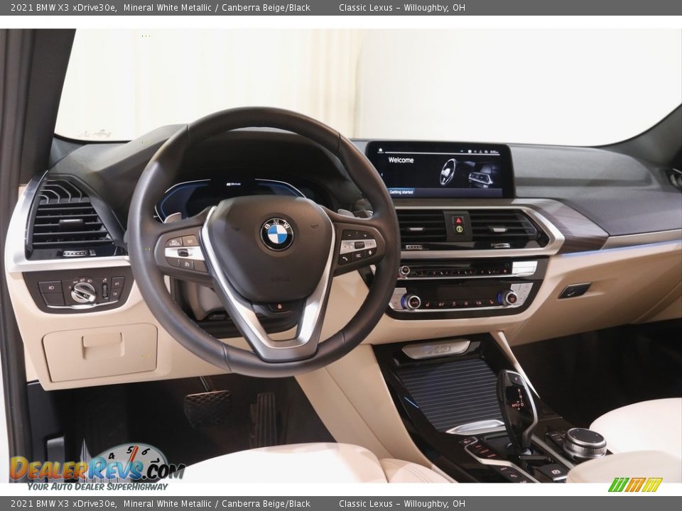 Dashboard of 2021 BMW X3 xDrive30e Photo #7