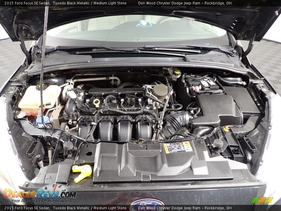 2015 Ford Focus SE Sedan Tuxedo Black Metallic / Medium Light Stone Photo #5