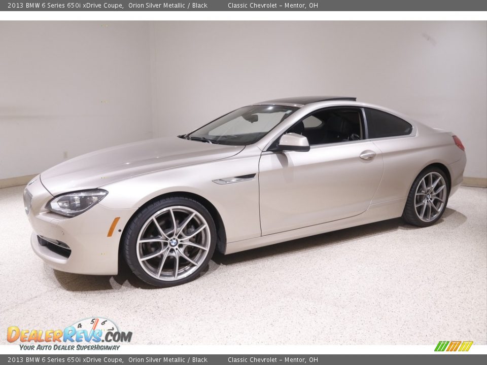 Front 3/4 View of 2013 BMW 6 Series 650i xDrive Coupe Photo #3