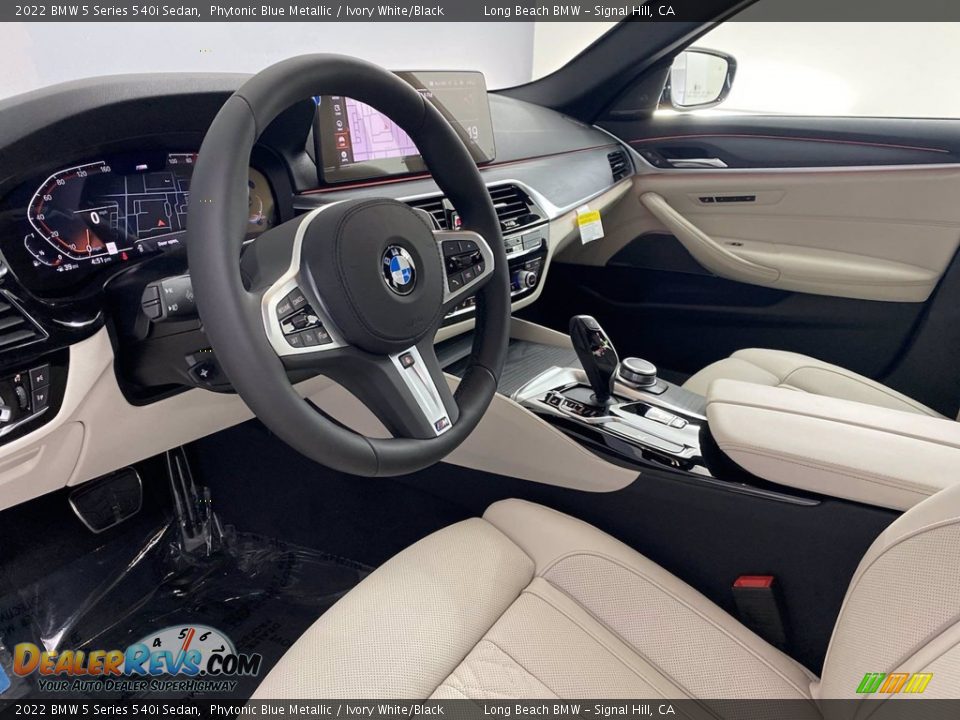 Front Seat of 2022 BMW 5 Series 540i Sedan Photo #12