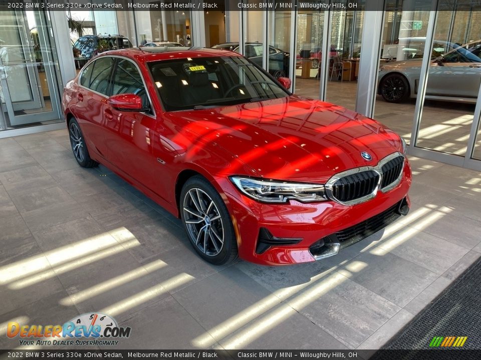 Front 3/4 View of 2022 BMW 3 Series 330e xDrive Sedan Photo #1