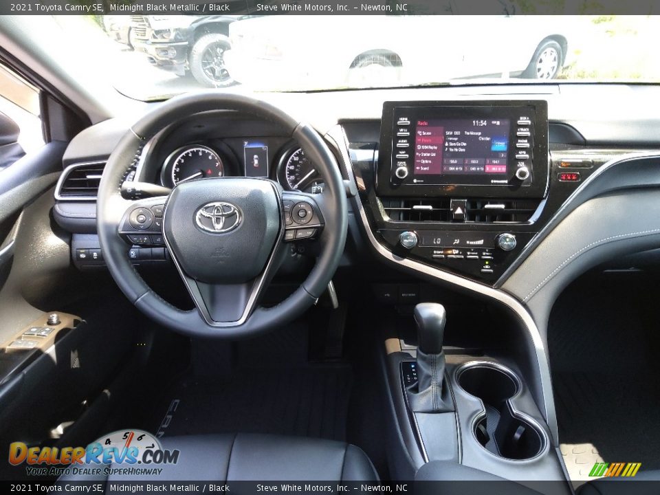 Dashboard of 2021 Toyota Camry SE Photo #16
