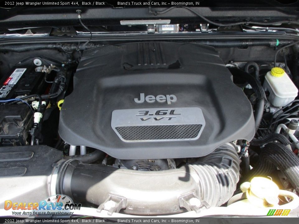 2012 Jeep Wrangler Unlimited Sport 4x4 Black / Black Photo #27