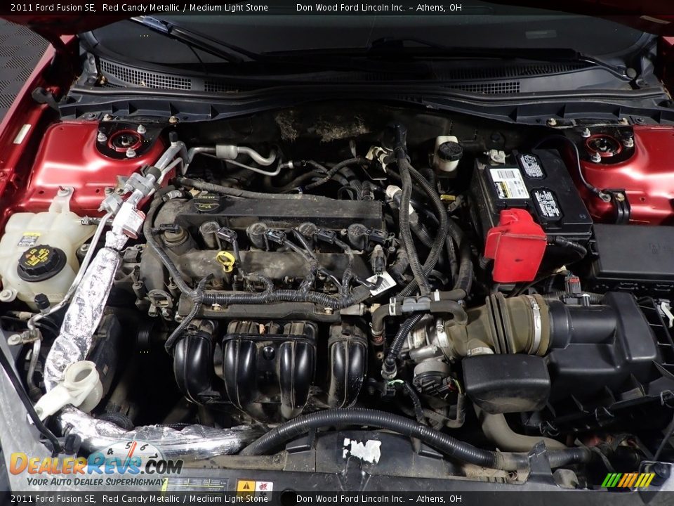 2011 Ford Fusion SE Red Candy Metallic / Medium Light Stone Photo #6