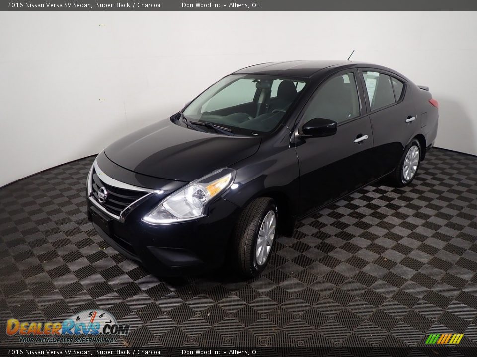 Super Black 2016 Nissan Versa SV Sedan Photo #8