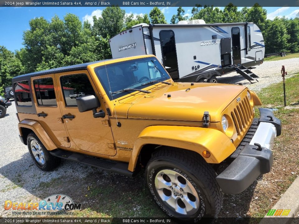 Amp'd 2014 Jeep Wrangler Unlimited Sahara 4x4 Photo #2