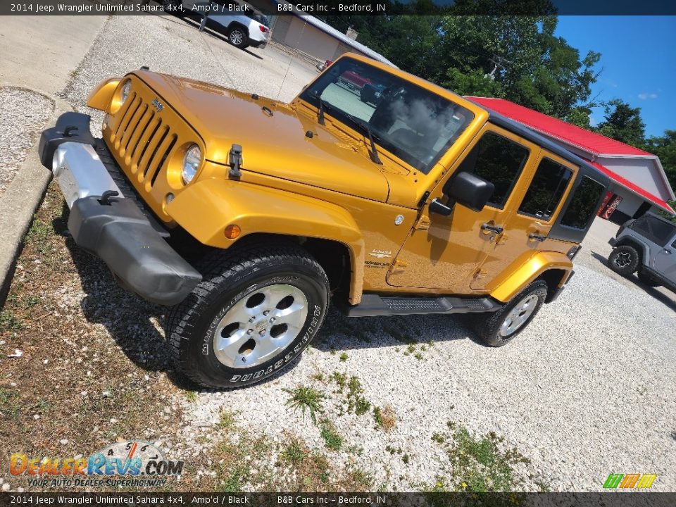 Front 3/4 View of 2014 Jeep Wrangler Unlimited Sahara 4x4 Photo #4