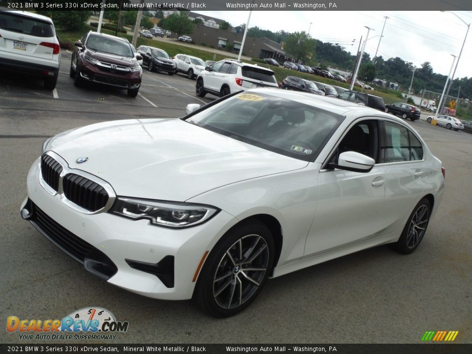 Front 3/4 View of 2021 BMW 3 Series 330i xDrive Sedan Photo #6