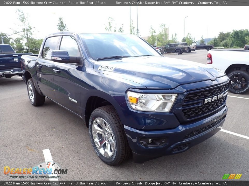 Front 3/4 View of 2022 Ram 1500 Big Horn Crew Cab 4x4 Photo #8