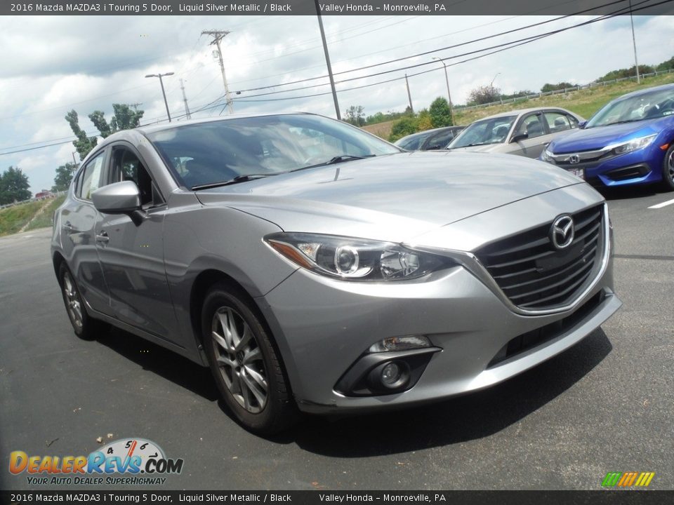 Front 3/4 View of 2016 Mazda MAZDA3 i Touring 5 Door Photo #4