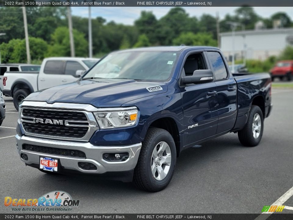 Front 3/4 View of 2022 Ram 1500 Big Horn Quad Cab 4x4 Photo #1