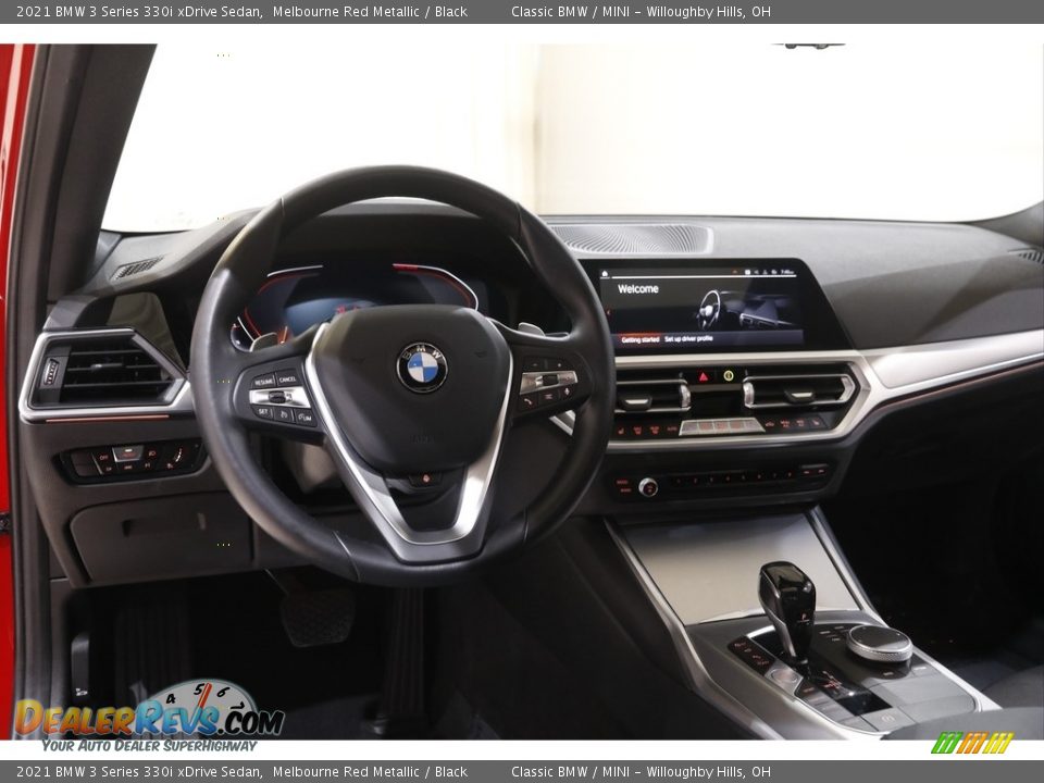 Dashboard of 2021 BMW 3 Series 330i xDrive Sedan Photo #6