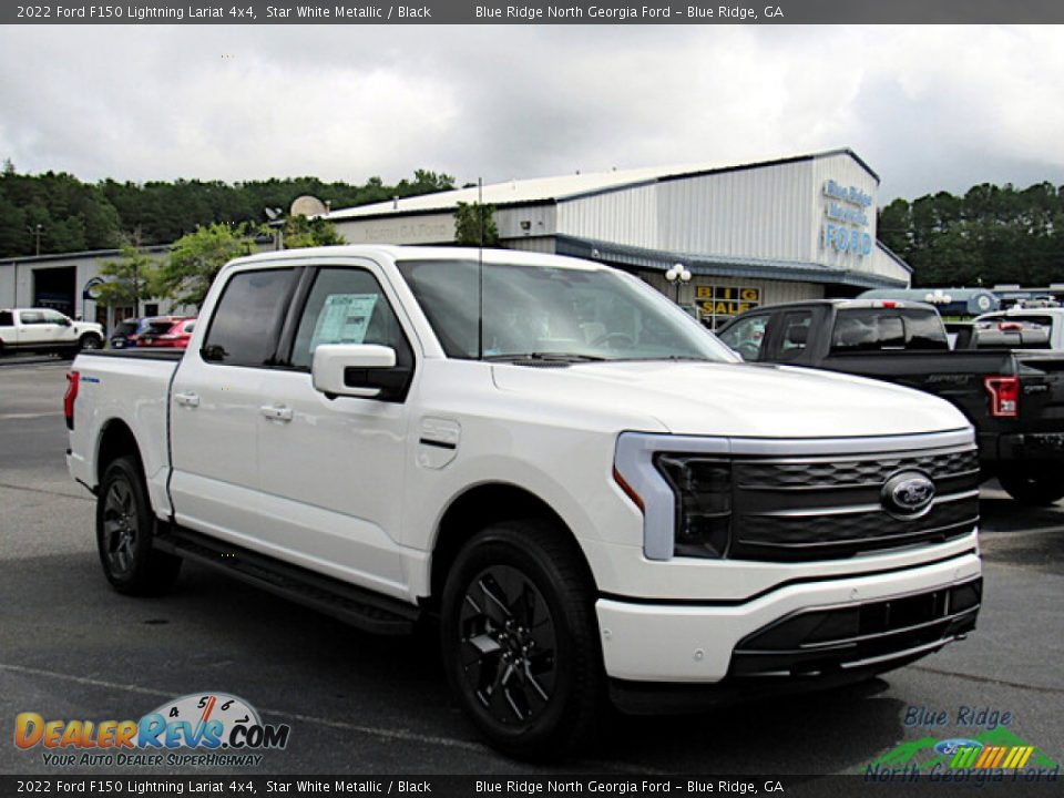 Front 3/4 View of 2022 Ford F150 Lightning Lariat 4x4 Photo #7