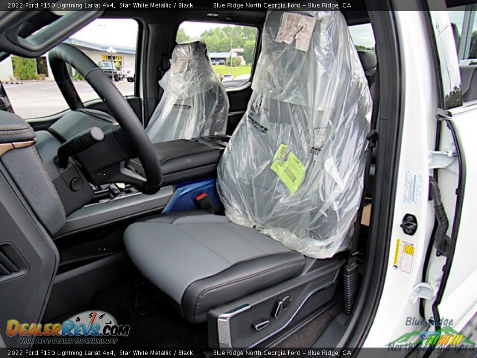 Front Seat of 2022 Ford F150 Lightning Lariat 4x4 Photo #11