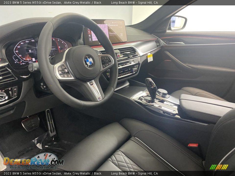 Front Seat of 2023 BMW 5 Series M550i xDrive Sedan Photo #12