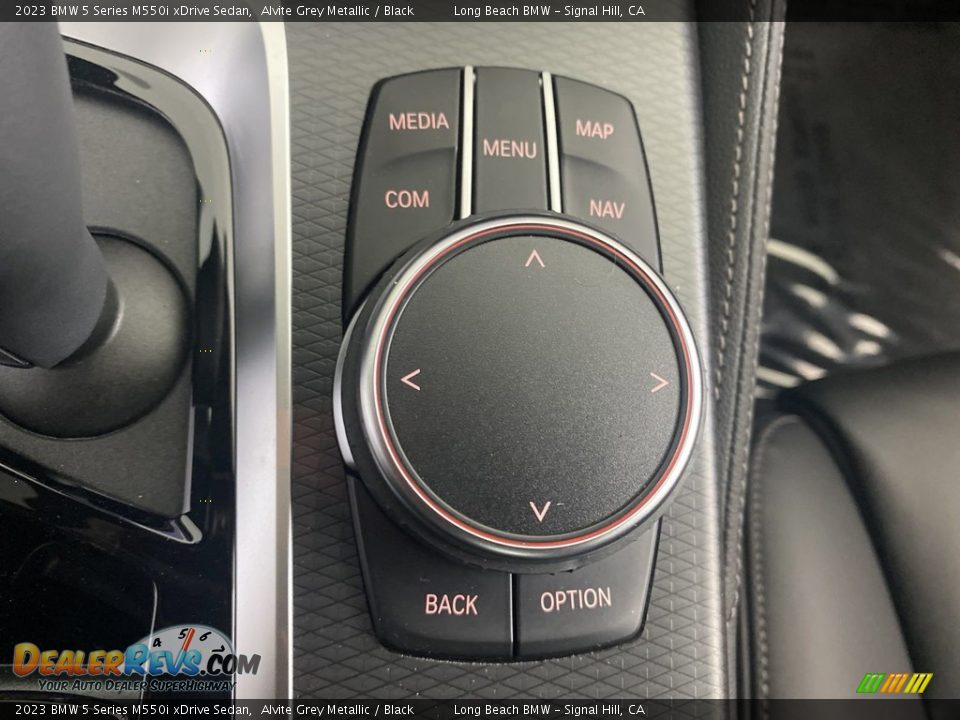 Controls of 2023 BMW 5 Series M550i xDrive Sedan Photo #24