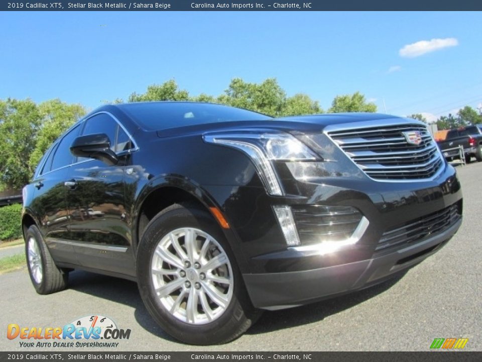 2019 Cadillac XT5 Stellar Black Metallic / Sahara Beige Photo #1
