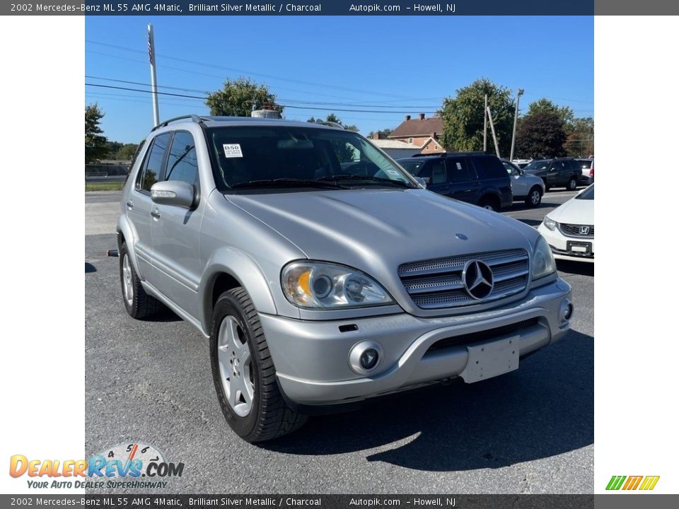 Front 3/4 View of 2002 Mercedes-Benz ML 55 AMG 4Matic Photo #3