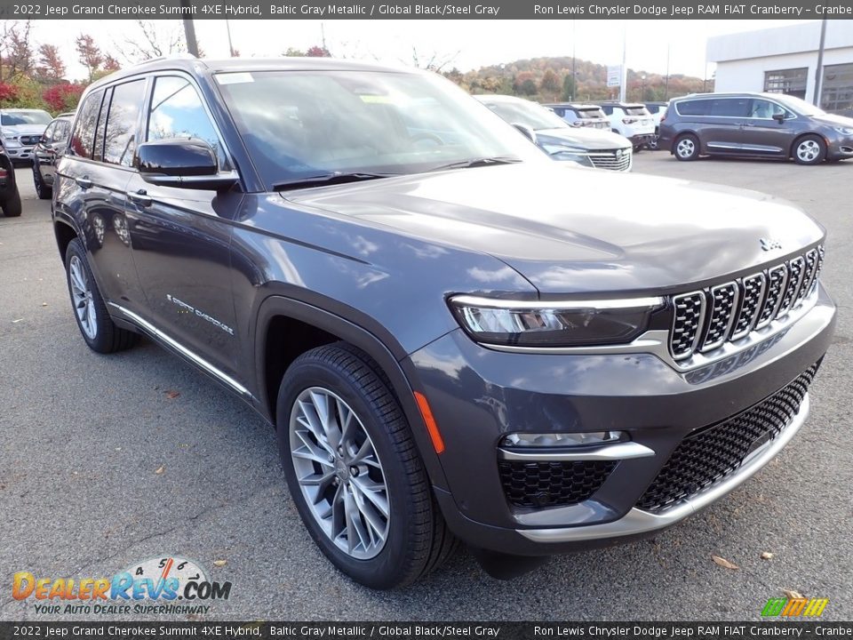 Front 3/4 View of 2022 Jeep Grand Cherokee Summit 4XE Hybrid Photo #7