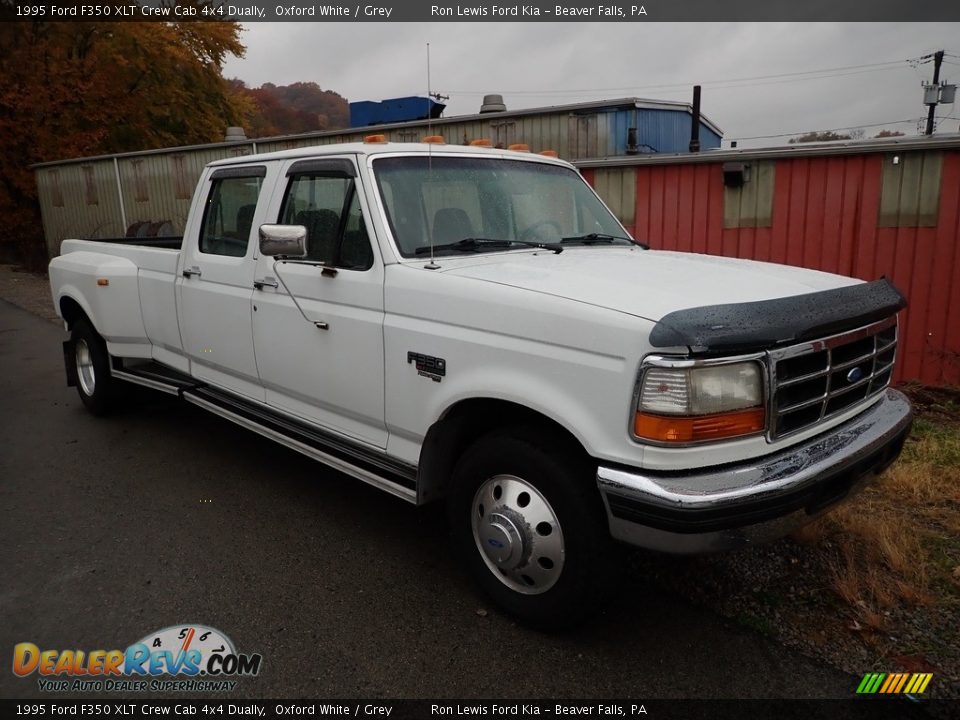 Front 3/4 View of 1995 Ford F350 XLT Crew Cab 4x4 Dually Photo #3